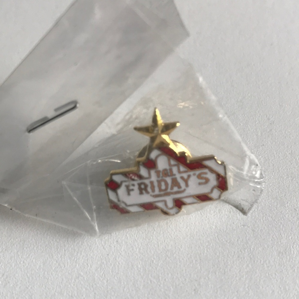 TGI Friday’s Star pin- new in bag